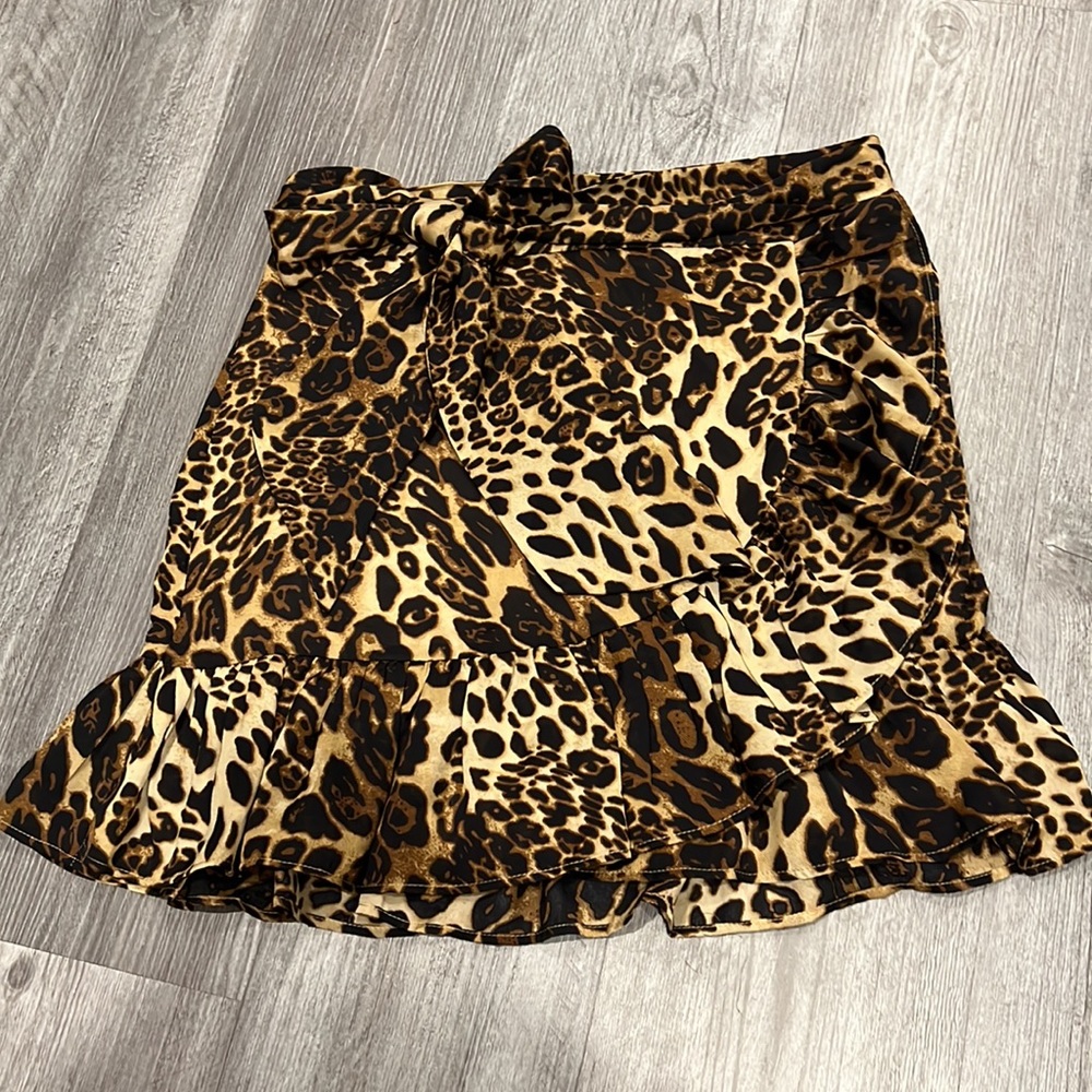 Aqua leopard print mini skirt with ruffle